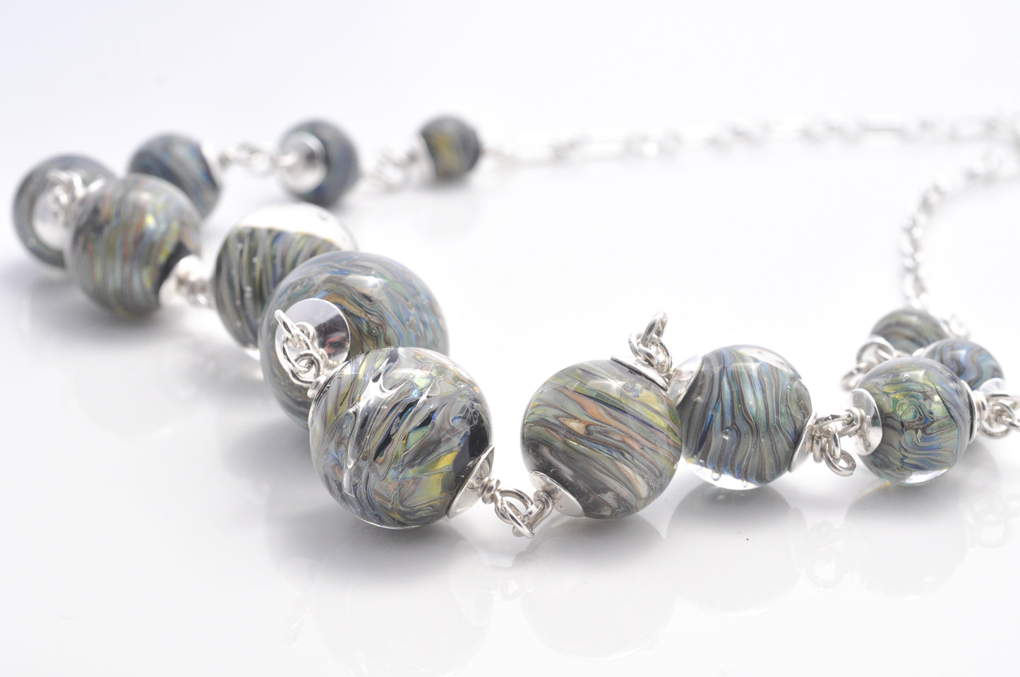 Graduated necklace: Triton swirl